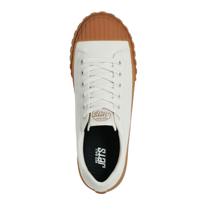 White sneaker with gum sole on a white background