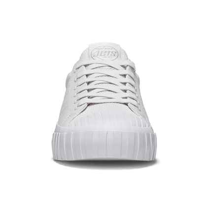 White sneaker with brand logo on a white background